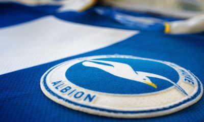 Brighton & Hove Albion football shirt & badge